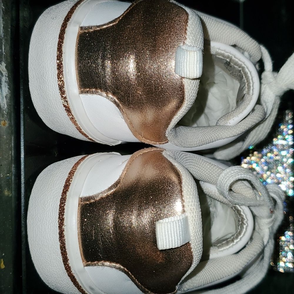 White leather rose gold sneakers